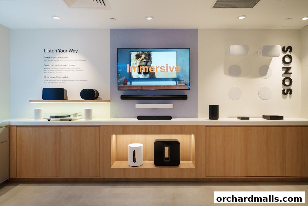 Sonos store display featuring soundbars, speakers, and a TV with immersive content.