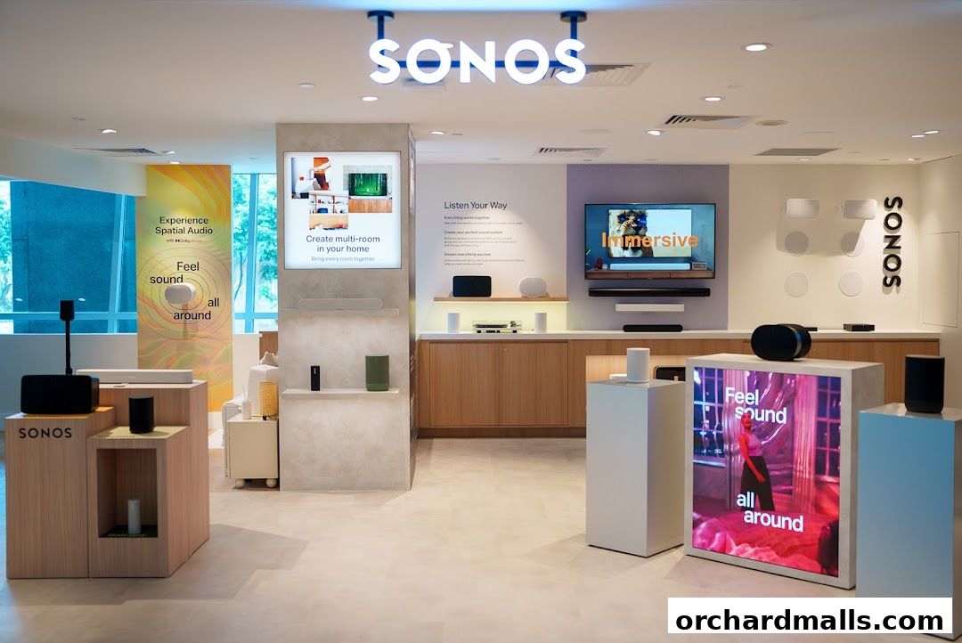 Interior of a Sonos store showcasing various audio products and interactive displays.