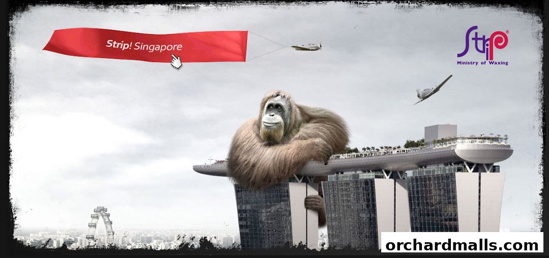 An orangutan sits atop a skyscraper with a banner reading 'Strip! Singapore' flying nearby.