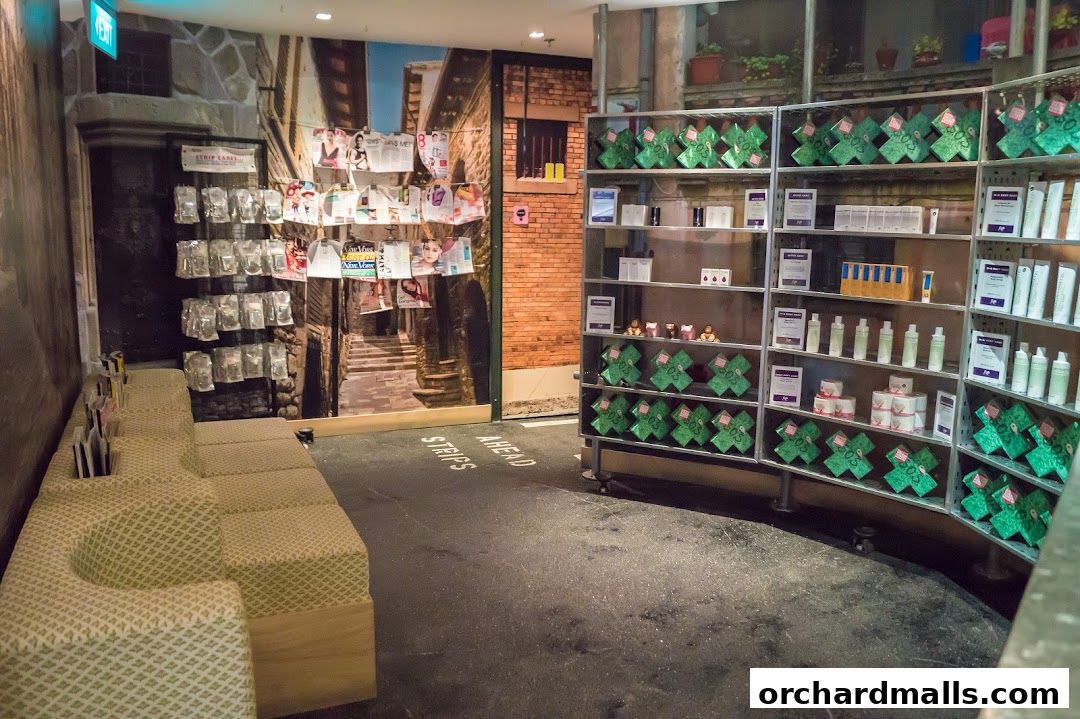Interior of a retail shop with product displays and seating area.