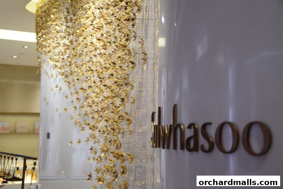 Sulwhasoo boutique interior with a striking gold decorative installation and the brand's logo.