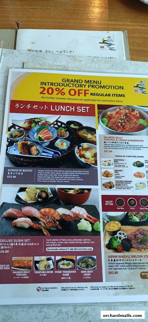 A menu from SUN with MOON Japanese Dining Cafe featuring lunch sets and sushi.