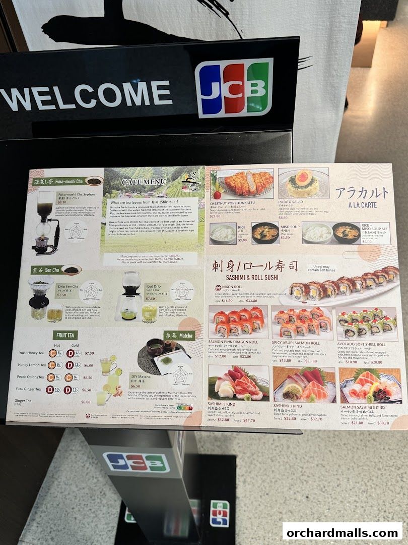 A menu for SUN with MOON Japanese Dining Cafe featuring teas, sushi, and sashimi.
