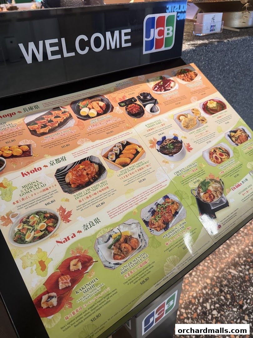 A menu display for SUN with MOON Japanese Dining Cafe, showcasing various dishes with images and prices.