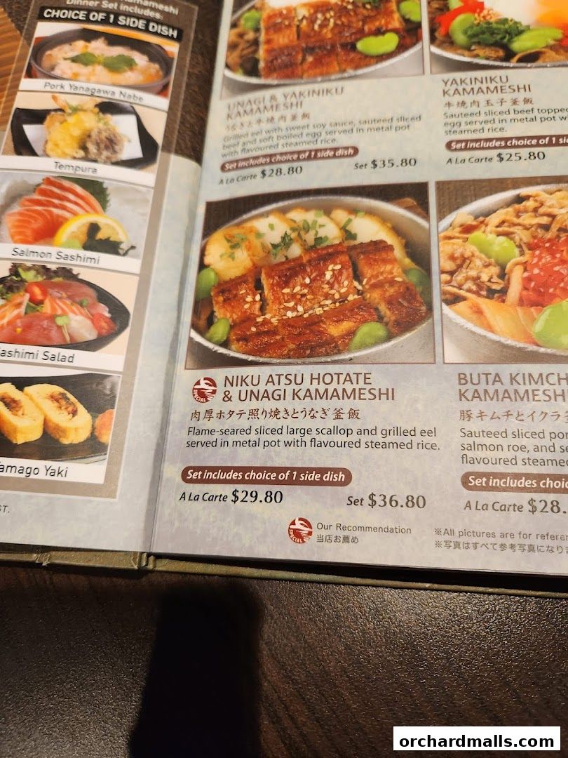 A menu from SUN with MOON Japanese Dining Cafe showcasing various Japanese dishes.