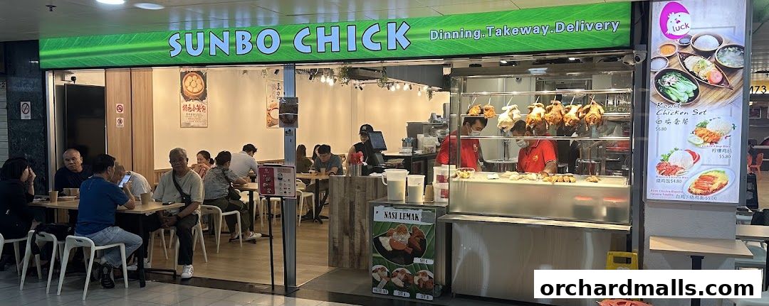 SUNBO CHICK restaurant with roasted chickens displayed and a menu board showing chicken sets.