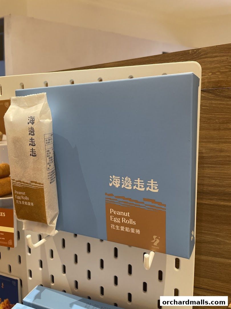 A display of SunnyHills Orchard's Peanut Egg Rolls in attractive packaging.