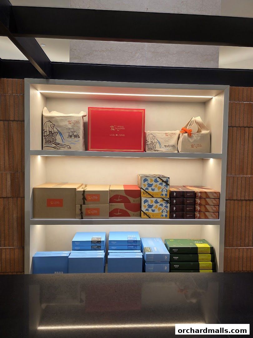 Shelves display various gift boxes and packaged goods from SunnyHills Orchard.