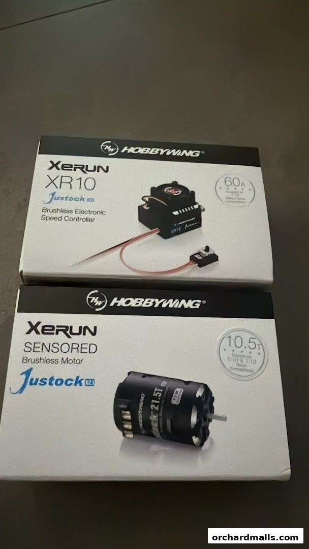 Two boxes of Hobbywing XeRun electronic speed controllers and brushless motors.