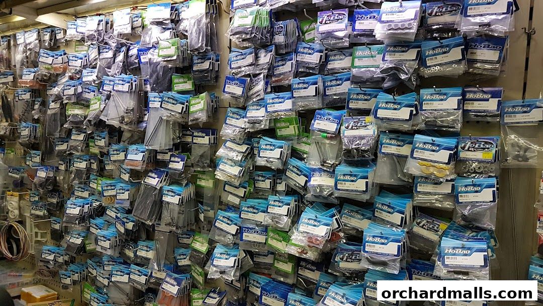 Wall display of various small parts and accessories for model vehicles.