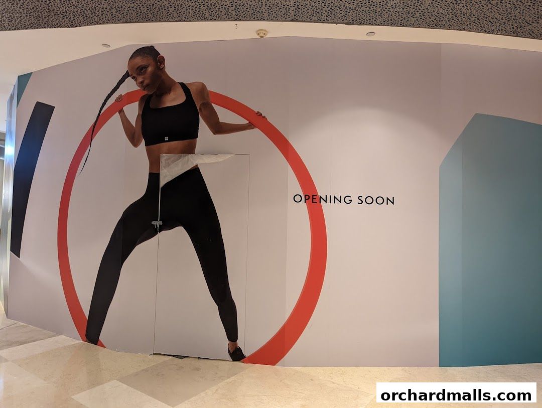 A large graphic advertises the upcoming opening of a Sweaty Betty store.