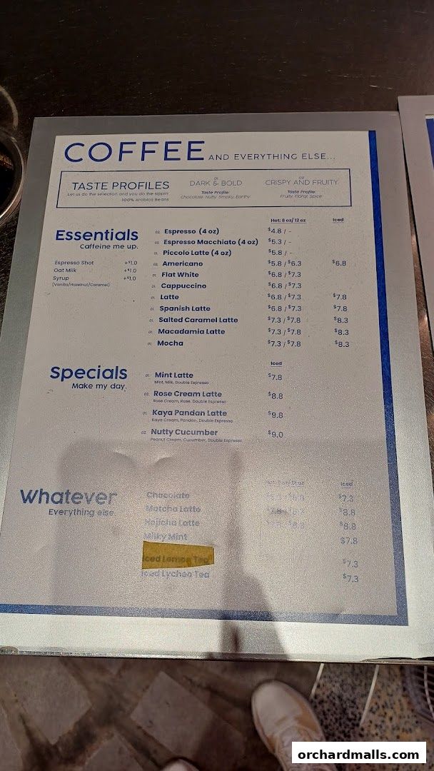 A menu for TAG Espresso featuring coffee drinks, specials, and other beverages.