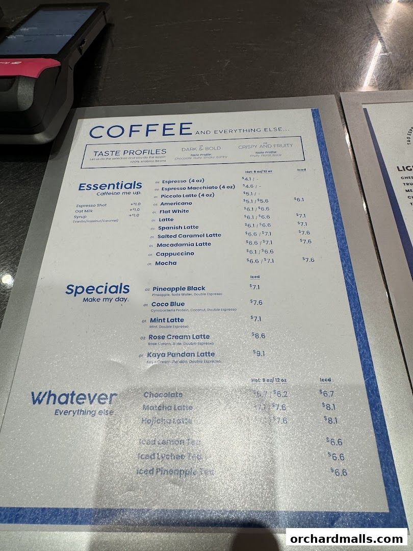 A menu for TAG Espresso featuring coffee drinks, specials, and other beverages.