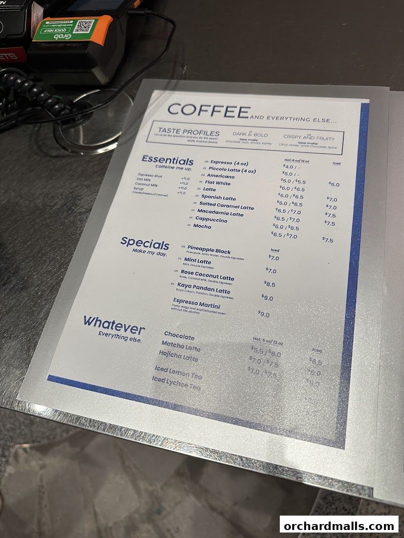 A menu from TAG Espresso featuring coffee drinks, specials, and other beverages.