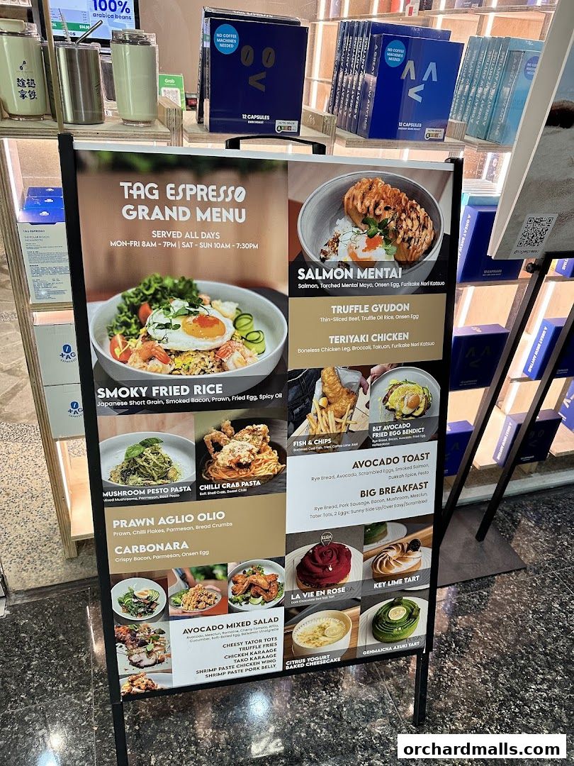 A menu board for TAG Espresso featuring various dishes and desserts.