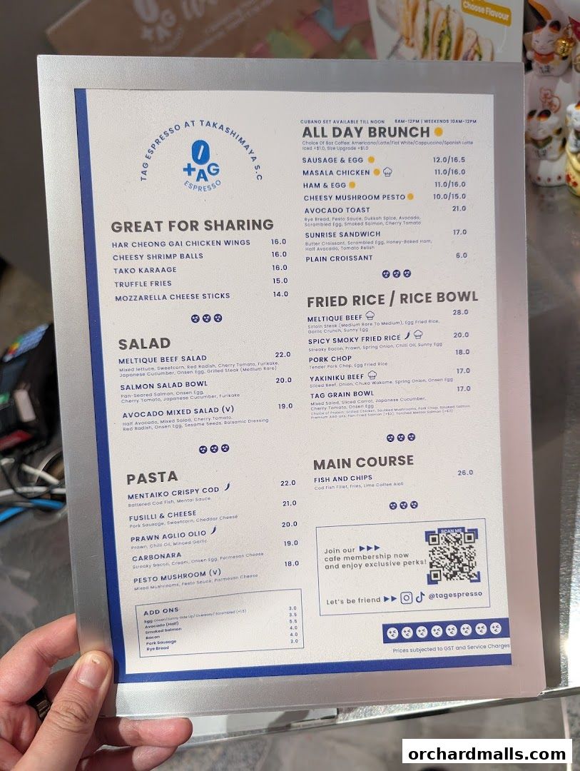 A menu from TAG Espresso featuring brunch, pasta, main courses, and add-ons.