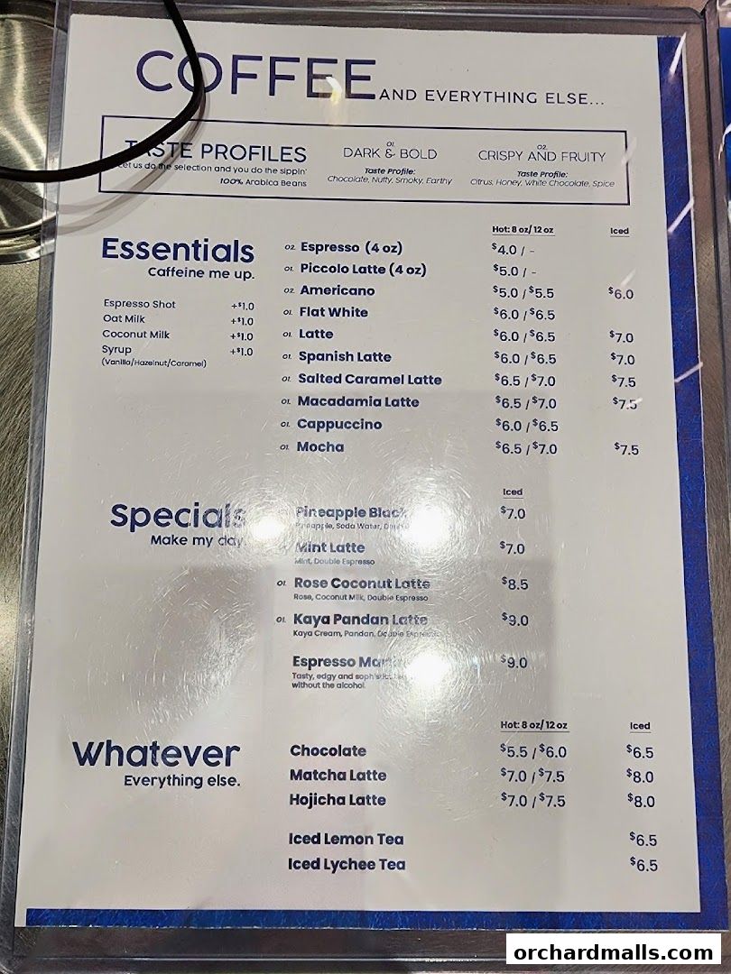 A menu for TAG Espresso featuring coffee drinks, specials, and other beverages.
