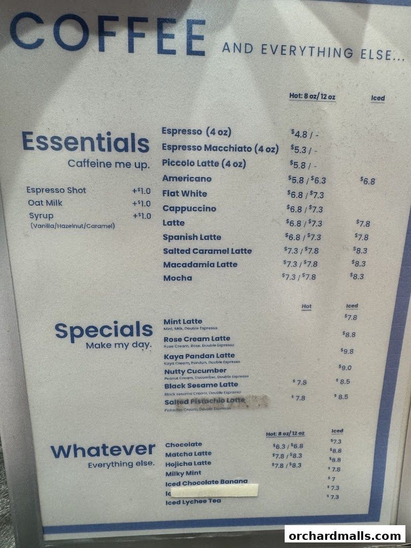 A menu board for TAG Espresso, featuring coffee drinks and specials.