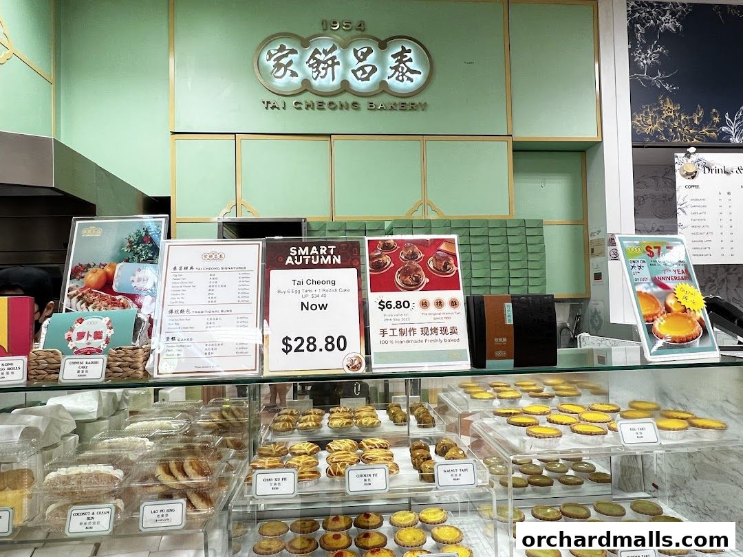 A display of freshly baked pastries and tarts at Tai Cheong Bakery.