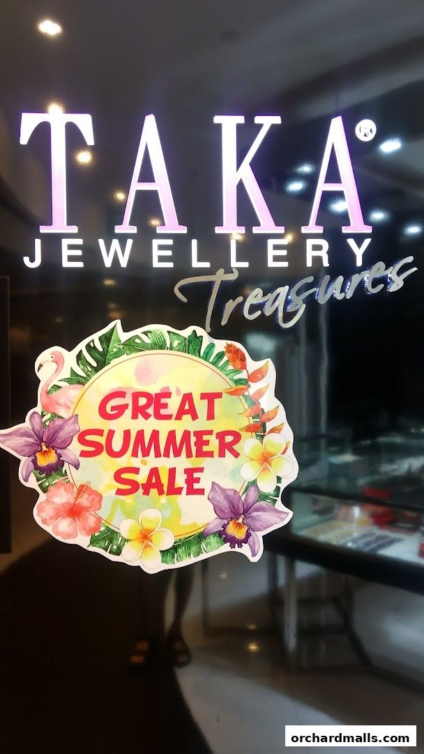 TAKA Jewellery Treasures shop front with a 'Great Summer Sale' sticker.