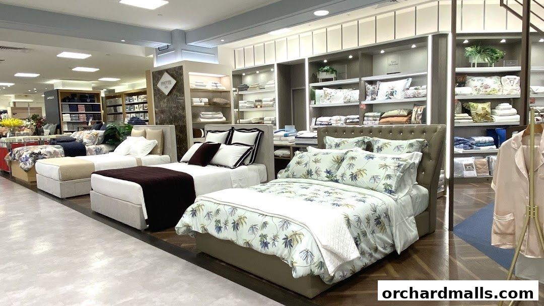 A well-lit department store section showcasing various bedding sets and linens.