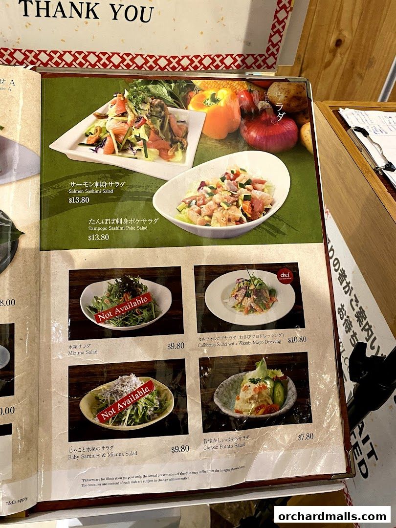 A menu page from Tampopo restaurant featuring various salads with prices and images.