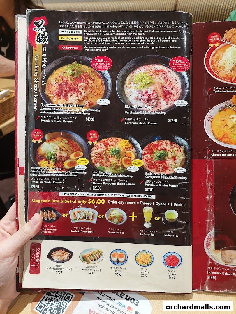A menu featuring various ramen dishes, gyoza, and drinks from Tampopo.