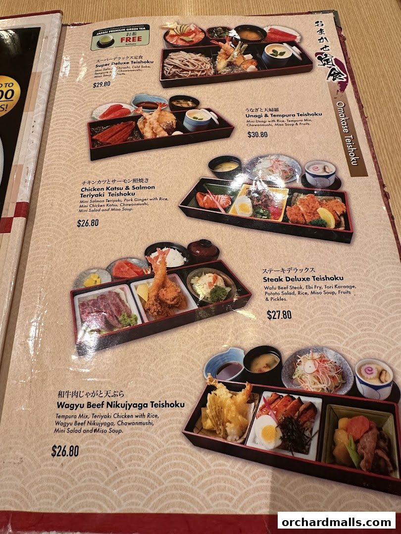 A menu page from Tampopo featuring various Japanese teishoku sets with descriptions and prices.