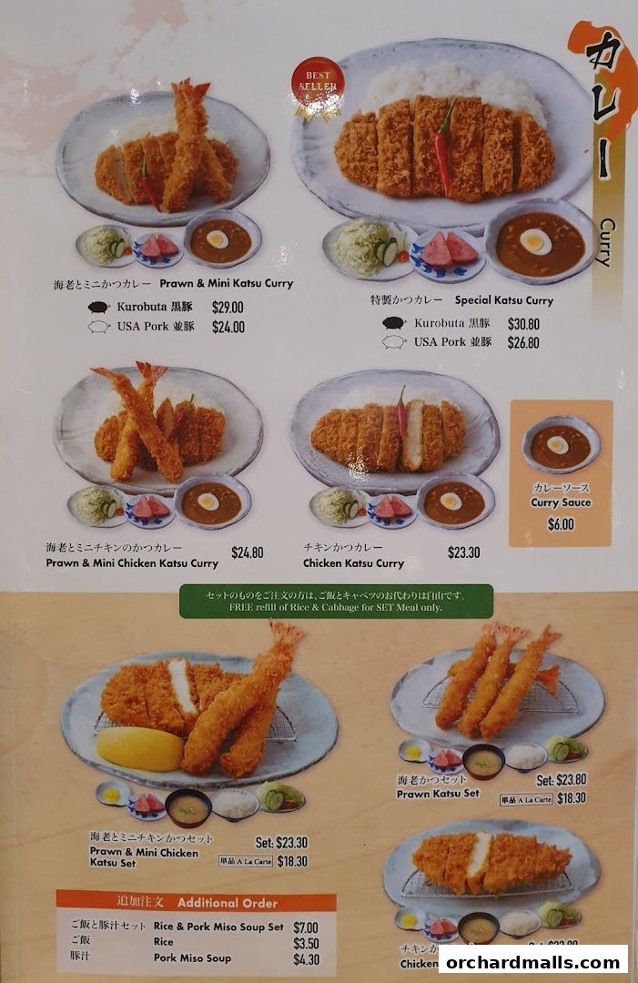 A menu from Tampopo featuring various katsu curry dishes and sets with prices.