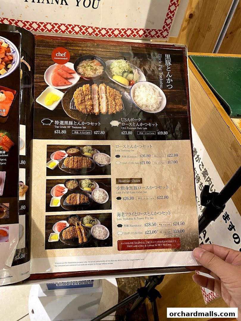 A menu from Tampopo featuring various tonkatsu and prawn fry sets with prices.