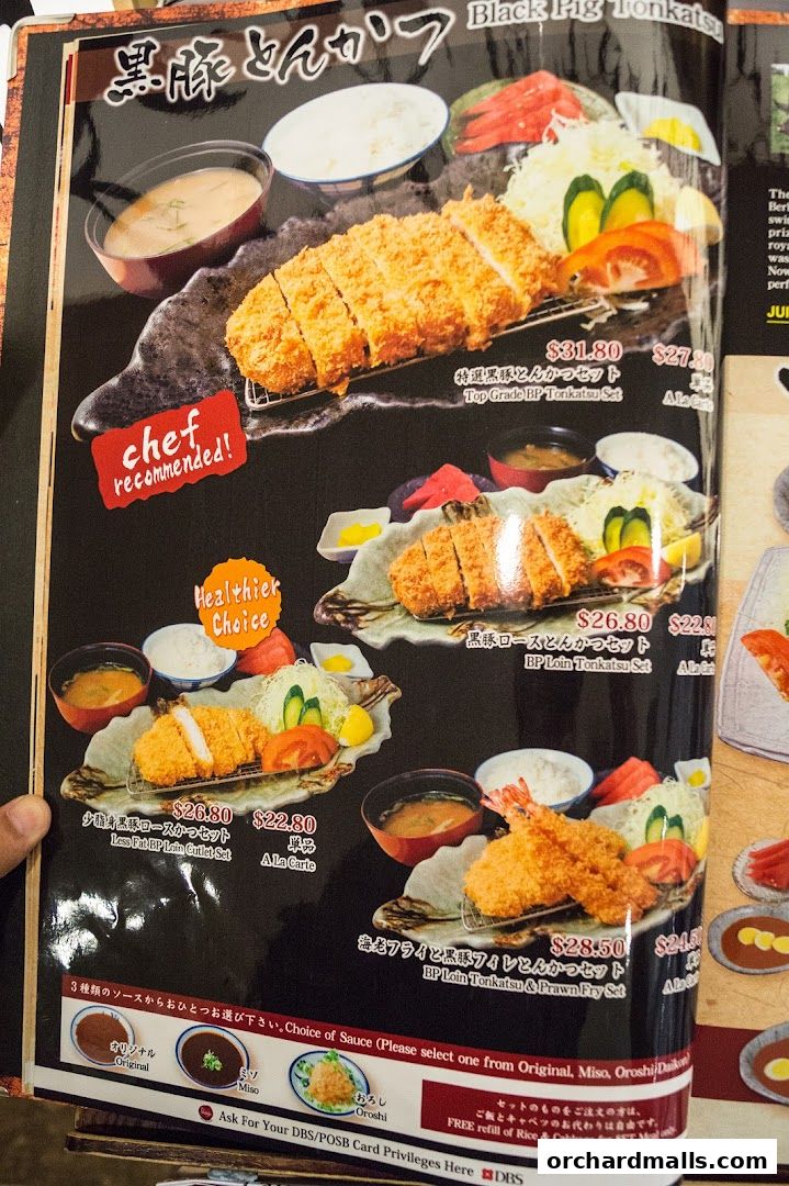A menu page showcasing various Black Pig Tonkatsu dishes with prices and descriptions.