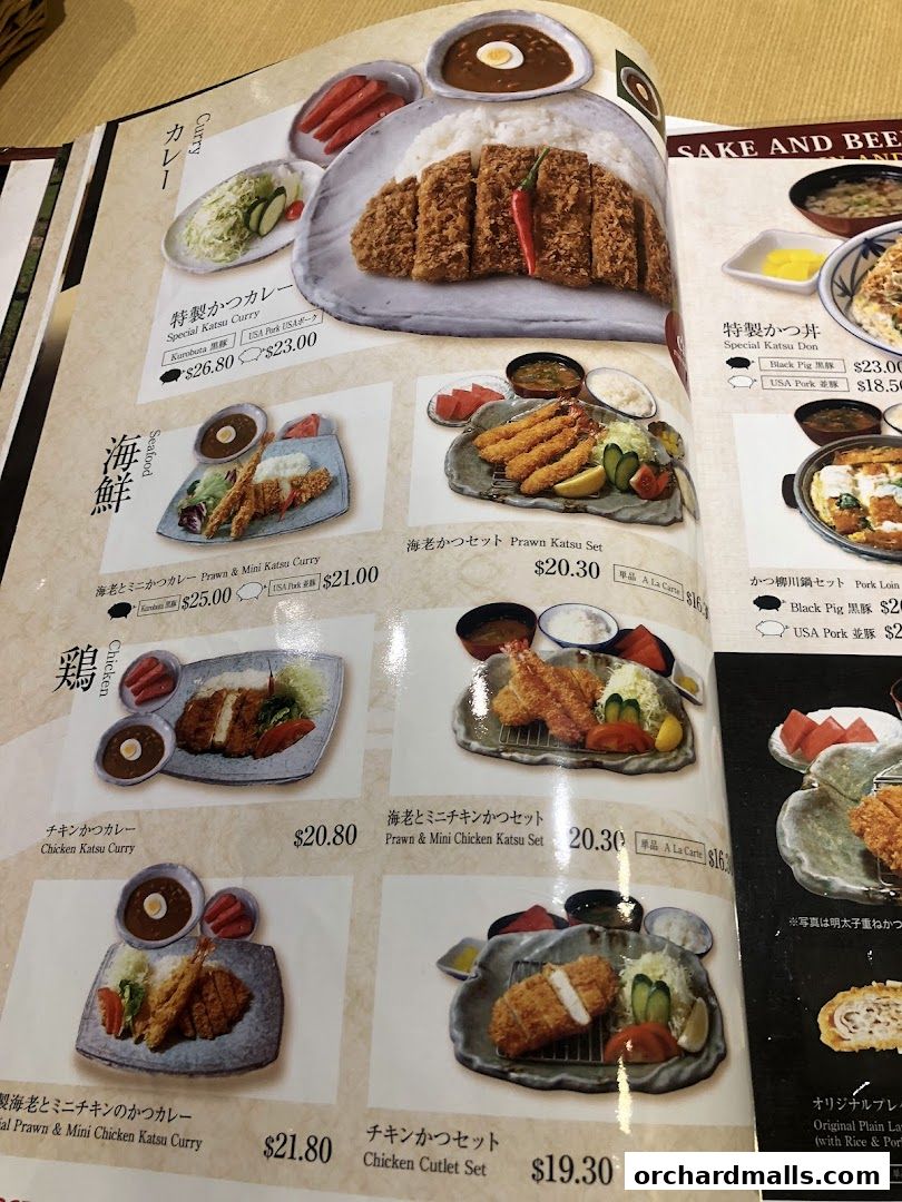 A menu from Tampopo restaurant showcasing various katsu curry and set meals with prices.