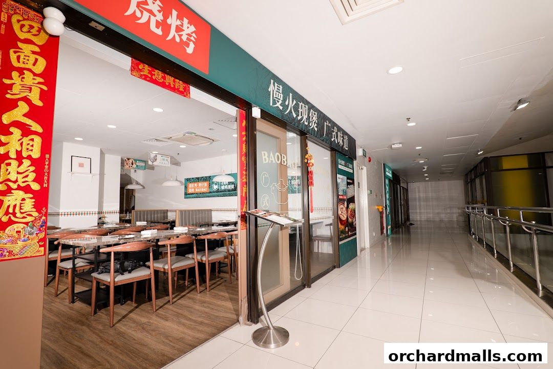 Entrance of TangBaoBao汤宝煲猪肚鸡 restaurant with seating visible inside.