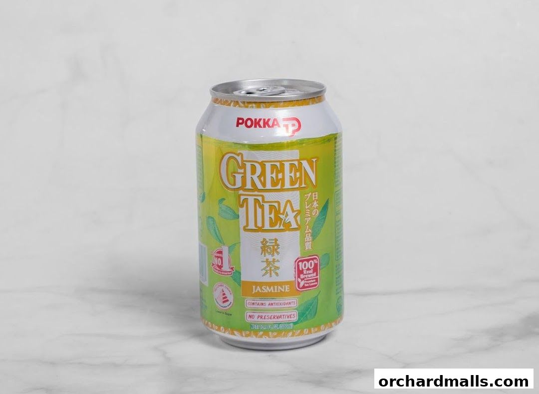 A can of Pokka Jasmine Green Tea with text indicating it contains antioxidants and no preservatives.