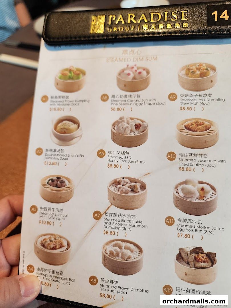 A menu featuring various steamed dim sum dishes with accompanying images and prices.
