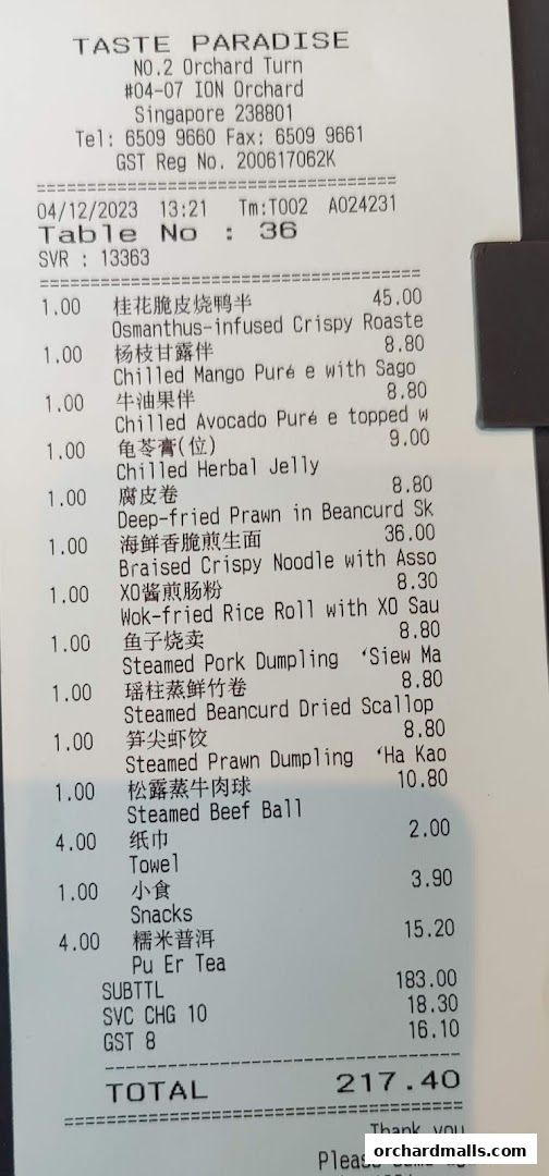 A receipt from Taste Paradise at Ion Orchard listing various food items and their prices.