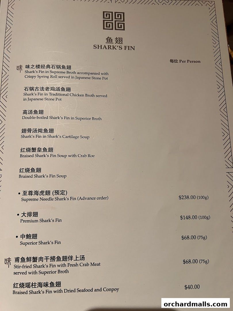 A menu from Taste Paradise featuring various shark's fin dishes with prices.
