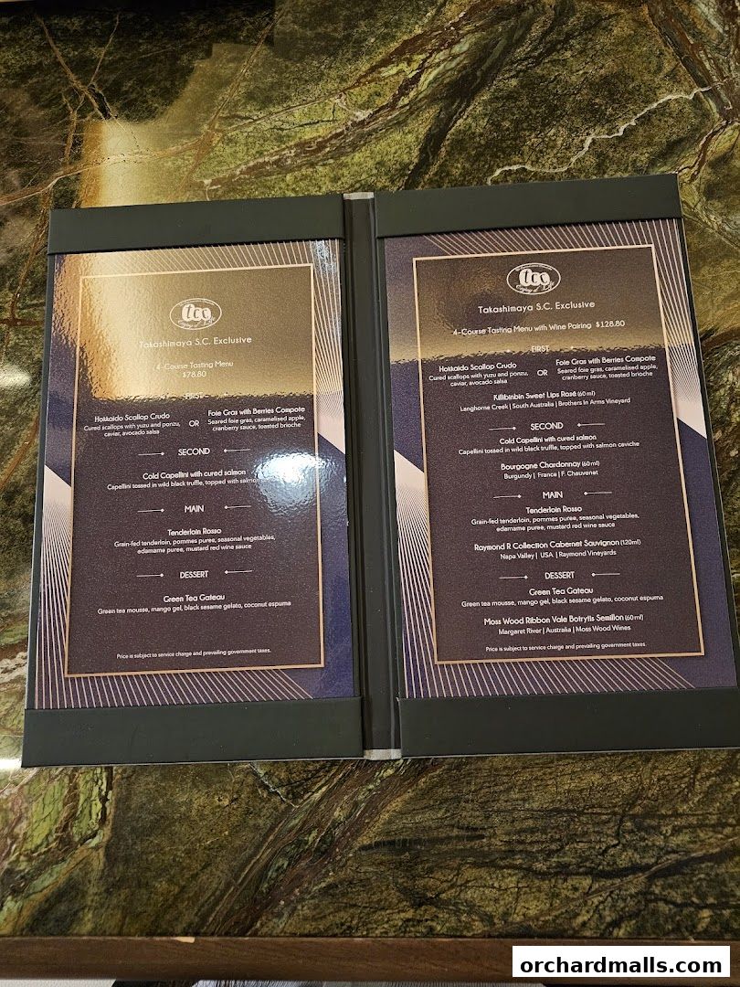 A menu from 'tcc - The Connoisseur Concerto' featuring tasting menus with wine pairings.
