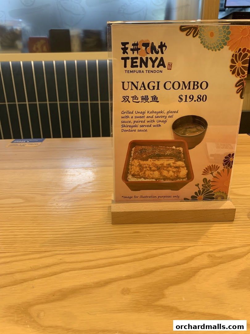 A menu display for Tenya's Unagi Combo, featuring grilled unagi.