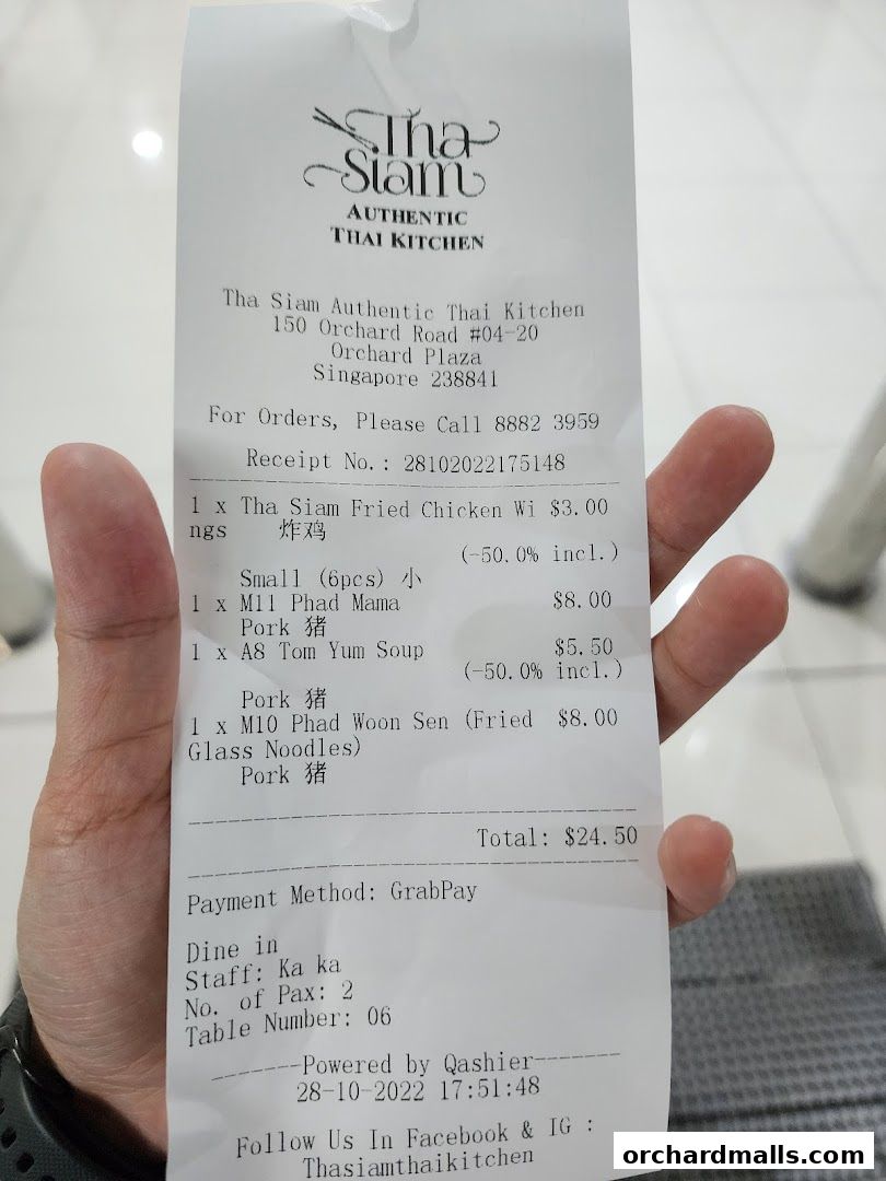 A receipt from Tha Siam Authentic Thai Kitchen showing food items and prices.
