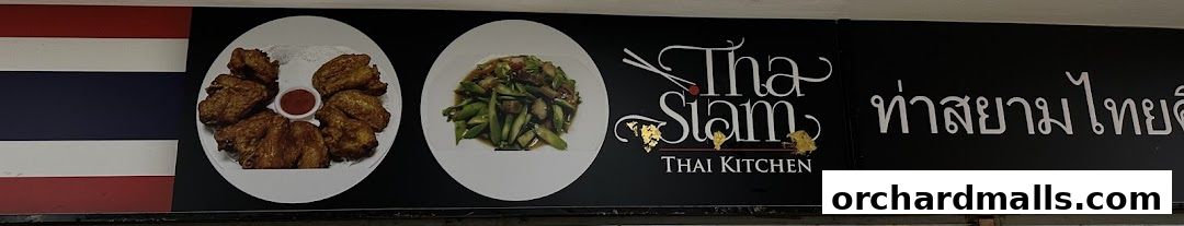 Signage for Tha Siam Thai Kitchen featuring Thai flag and images of Thai food.