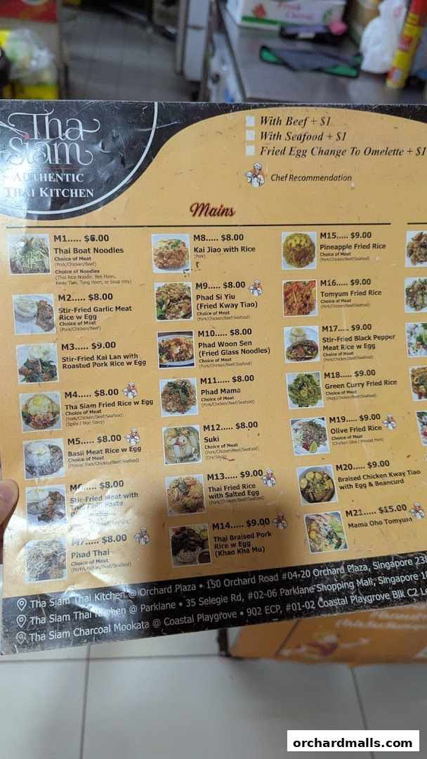 A menu from Tha Siam Authentic Thai Kitchen featuring various Thai dishes with prices and descriptions.