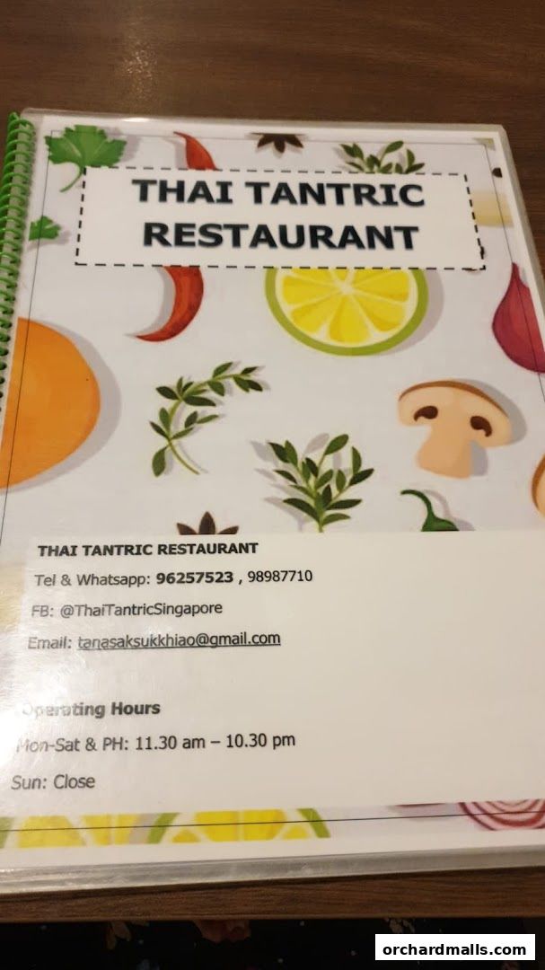 A menu cover for Thai Tantric Restaurant with contact information and operating hours.