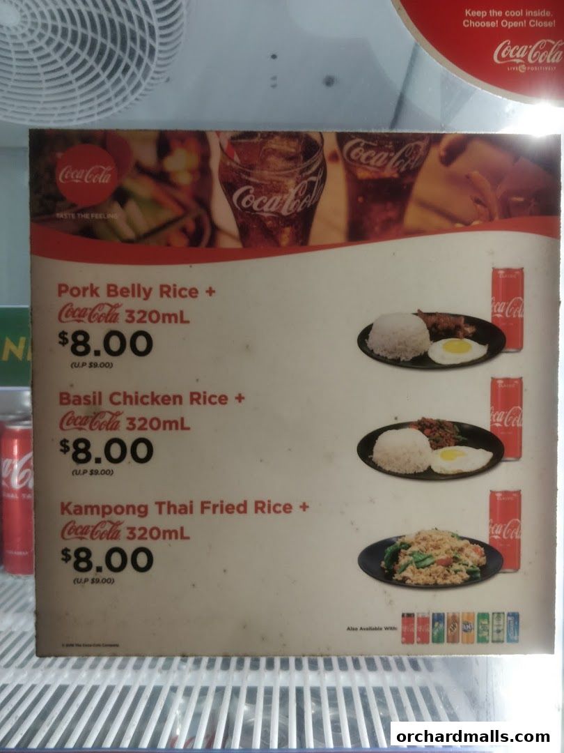A menu board displays Thai food combos with Coca-Cola drinks.