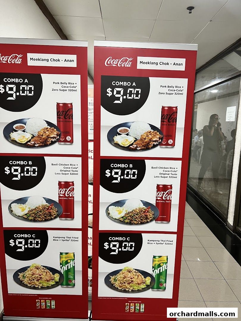 Promotional posters display Thai food combos with Coca-Cola and Sprite.