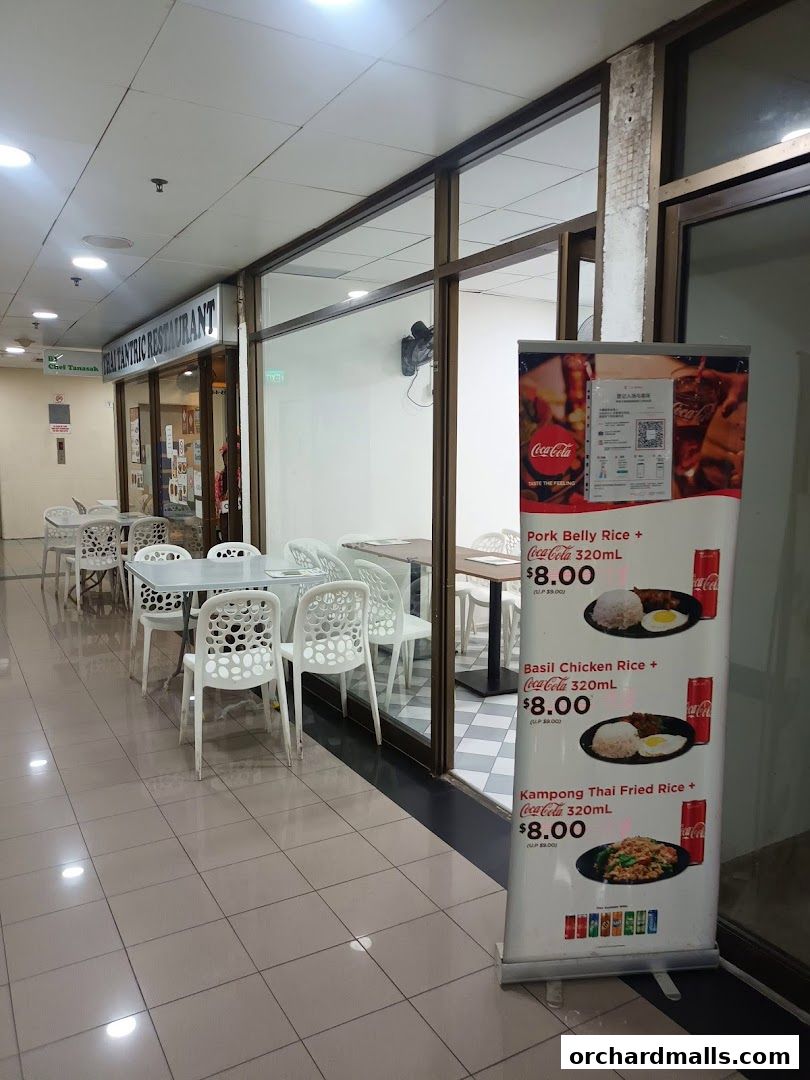 Exterior of Thai Tantric Authentic Thai Cuisine restaurant with a promotional banner.