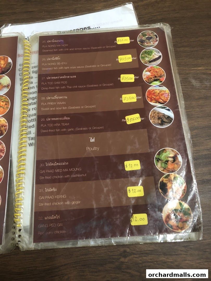 A menu from Thai Tantric Authentic Thai Cuisine featuring fish and chicken dishes.