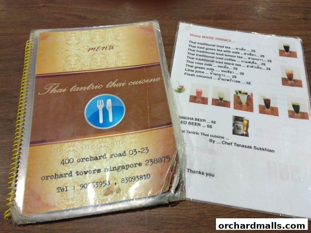 A menu for Thai Tantric Authentic Thai Cuisine with drinks and contact information.