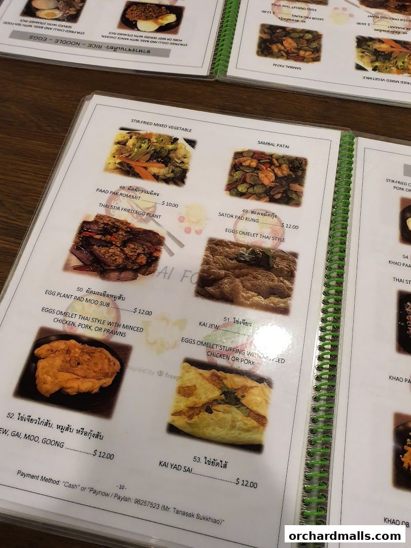 A menu page from Thai Tantric Authentic Thai Cuisine featuring various Thai dishes with images and prices.