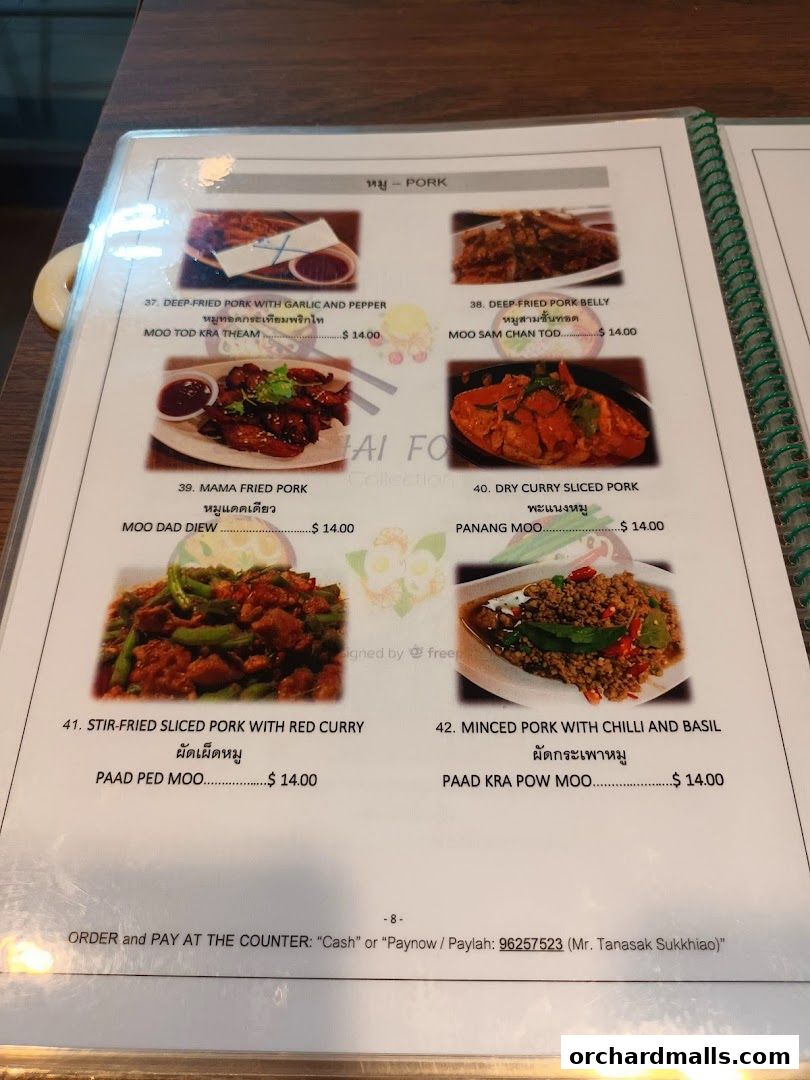 A menu page from Thai Tantric Authentic Thai Cuisine featuring pork dishes.